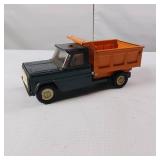Vintage Structo Kom-Pak pressed steel toy dump truck.
