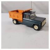 Vintage Structo Kom-Pak pressed steel toy dump truck.