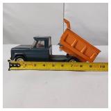 Vintage Structo Kom-Pak pressed steel toy dump truck.