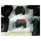 Lot of Binoculars with cases Plus a Laser Level