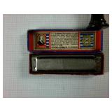 Lot of Musical Flutes, a harmonica and tone whistle