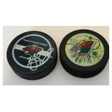 2 Minnesota Wild Signed Hockey Pucks (Players Unknown)