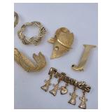6 Gold Brooches/Pins