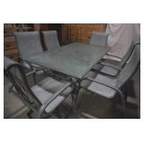 Glass Patio Table and 6 Chairs