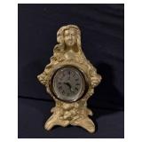 Gold-tone Figurine Clock with Floral Motif