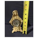 Gold-tone Figurine Clock with Floral Motif