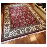 Large Area Rug with Red Floral Pattern