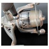 ML - Pair of Fishing Poles with Reels and Assorted Tackle Boxes and Lures