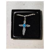 Cross with turquoise gem
