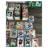Lot of Football Cards and One Starting Lineup Figurine (Russell Maryland)