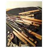 Bucket of ice fishing rods, cleats and more