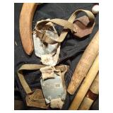 Bucket of ice fishing rods, cleats and more