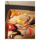 Box of spinners, lures and a tin of hooks