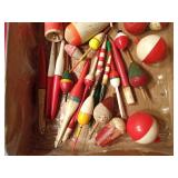 Flat of vintage wood, cork and plastic fishing bobbers