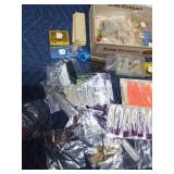 Cigar box of fishing items