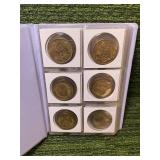 Pinnacle Mint lot of Brass Coins in Coin Album multiple sports possibly included