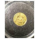 HALF GRAM .9999 FINE GOLD MONARCH METALS ROUND IN CASE