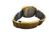 Vintage Digital Watch with Gold-Tone Bezel and Stainless Steel Back