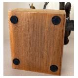 LL  - Metal Sculpture of Child on Swing Under Tree