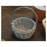 Lot of (2) Wicker Baskets - One 24" long Two Handle Basket and One 18" diameter Easter style One Handle Basket