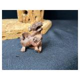 Mixed Decorative Lot: Driftwood Cross, Vintage Mallet, Animal Hide Plate, Red Resin Sculpture, Mini Foo Lion