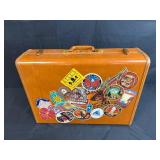 Vintage Samsonite Suitcase with Travel Stickers and Assorted Clothing