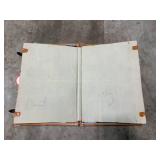 Vintage Samsonite Suitcase with Travel Stickers and Assorted Clothing