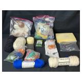 Collection of Wool Roving, Felting Supplies, and Yarn Assortment