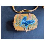 Collection of 4 Woven Baskets with Straps and Painted Lid Detail