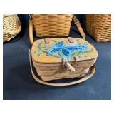 Collection of 4 Woven Baskets with Straps and Painted Lid Detail