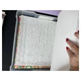 Assorted Scrapbook Paper Collection in Plastic Storage Case