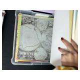 Assorted Scrapbook Paper Collection in Plastic Storage Case