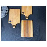 Mixed Kitchenware Collection with Cutting Boards, Serving Tray, and Metal Bowls
