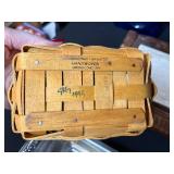Eclectic Decorative Collection with Blue Glass Bottles, Plates, Wood Dish, and Longaberger Basket