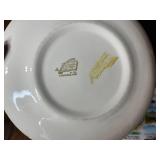 Eclectic Decorative Collection with Blue Glass Bottles, Plates, Wood Dish, and Longaberger Basket