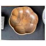 Eclectic Decorative Collection with Blue Glass Bottles, Plates, Wood Dish, and Longaberger Basket