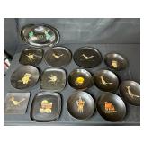 Collection of Vintage Metal Trays and Plates with Artistic Designs
