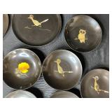 Collection of Vintage Metal Trays and Plates with Artistic Designs