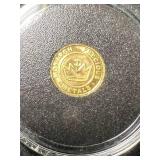 HALF GRAM .9999 FINE GOLD MONARCH METALS ROUND IN CASE