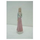 Vintage Porcelain Girl Figurine holding a pink rose. 12.5"tall