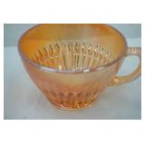 Vintage Federal glass Normandie  pattern marigold carnival glass bread plates(16), dinner plates(7) , luncheon plates(3), cups (9) , 1 other