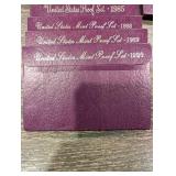 United States Mint Proof Sets Lot - 1984-1990 in Purple Card Packaging (Lot Of 10)