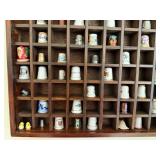 Fun Thimble Collection in a Wooden Cabinet