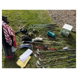 Golf Clubs in A Golf Bag, Ice Bucket, Etc.