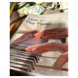 misc home decor  tire pump  how to play piano books