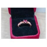 Rose Gold Tone Ring with Red Stones - Size 9.5