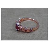 Rose Gold Tone Ring with Red Stones - Size 9.5