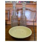 2 vintage wine bottles and pie plate