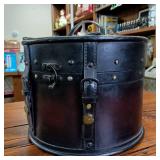 Front Latch Wood and Leather Round Box (Hat type) Very cool, hard to find carrying case  fine detail  leather straps  snap closure  10 inches wide by 9 inches