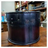 Front Latch Wood and Leather Round Box (Hat type) Very cool, hard to find carrying case  fine detail  leather straps  snap closure  10 inches wide by 9 inches